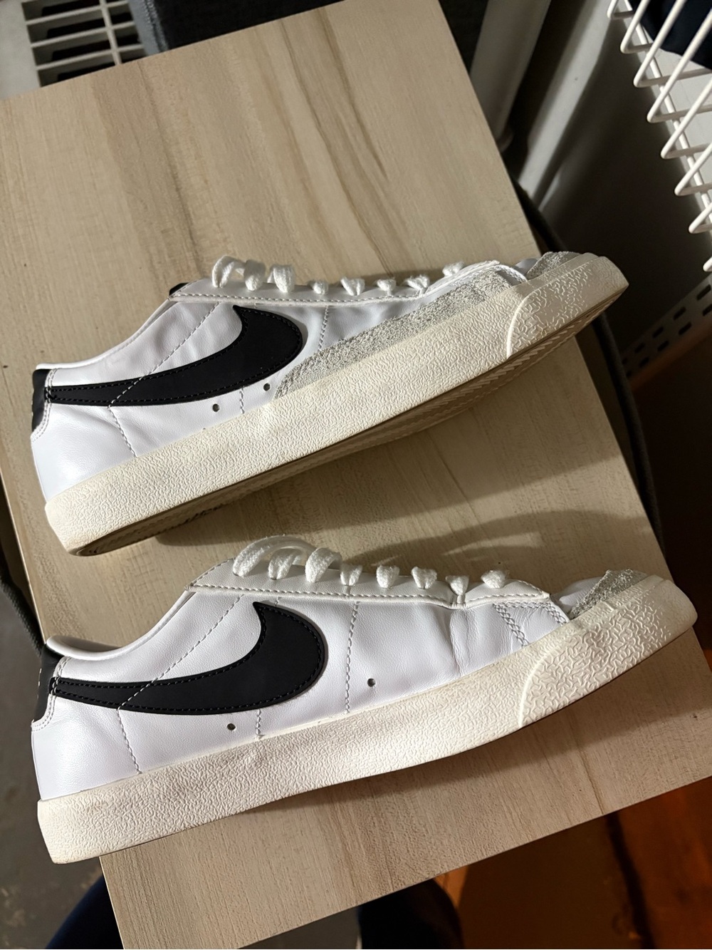 Nike White Sneakers with Black Swoosh - womens Low-Top